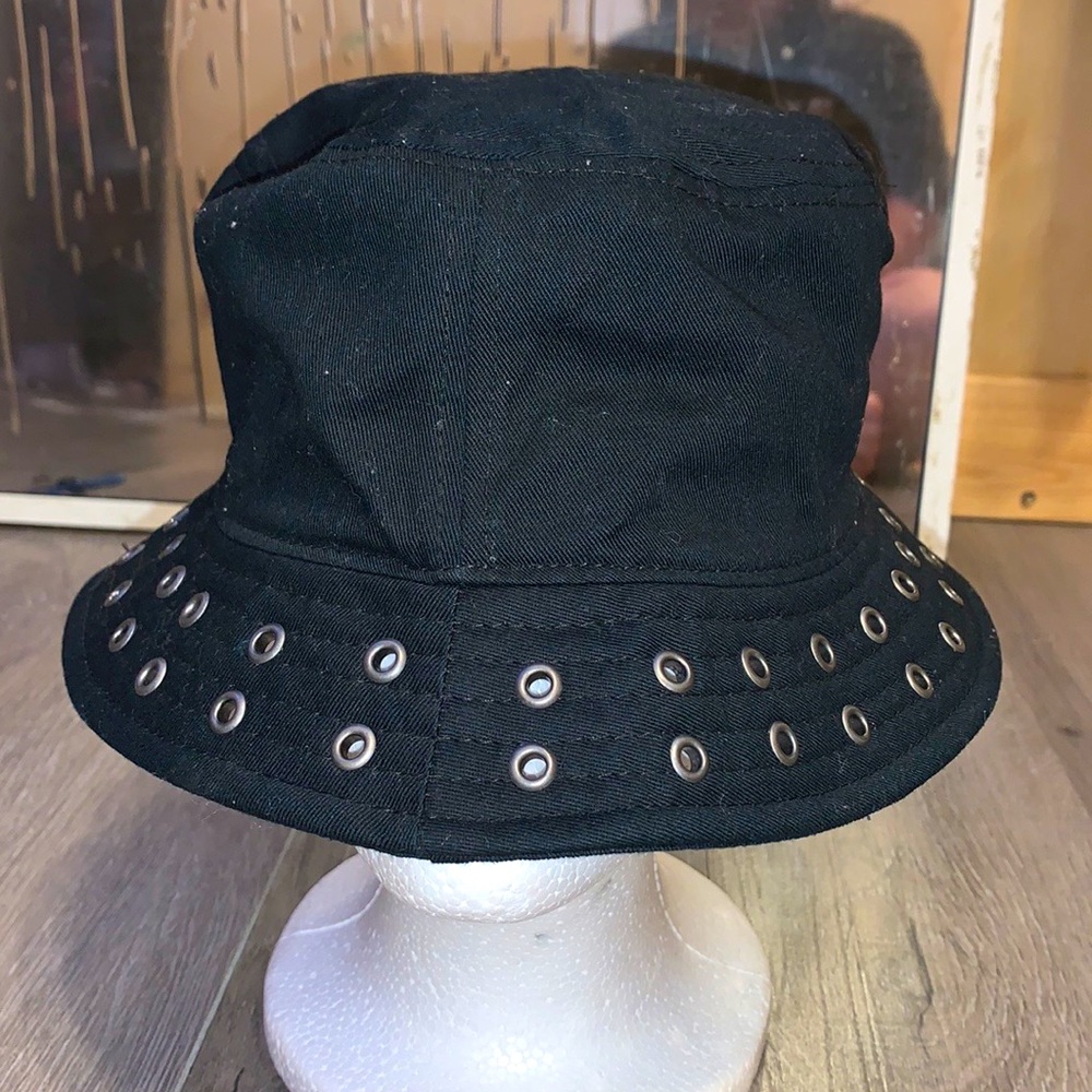 the brand is from hottopic, it’s made in china, and the color is black